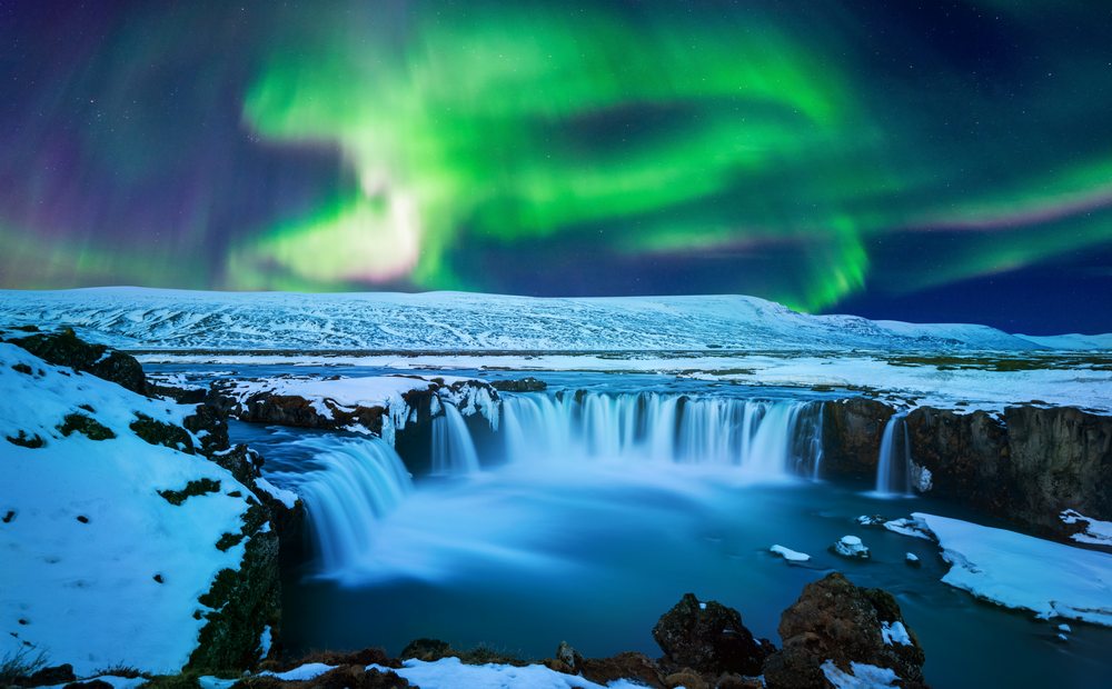 northern light aurora borealis godafoss waterfall winter iceland